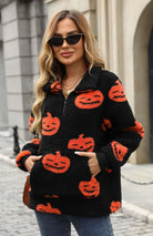 Pumpkin print fleece half-zip pullover in black for women