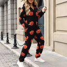 Pumpkin print hooded zip jumpsuit in black for women
