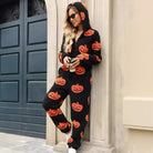 Pumpkin print hooded zip jumpsuit in black for women