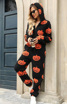 Pumpkin print hooded zip jumpsuit in black for women