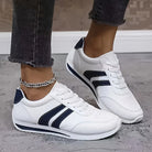 Striped leather-look sneakers for women