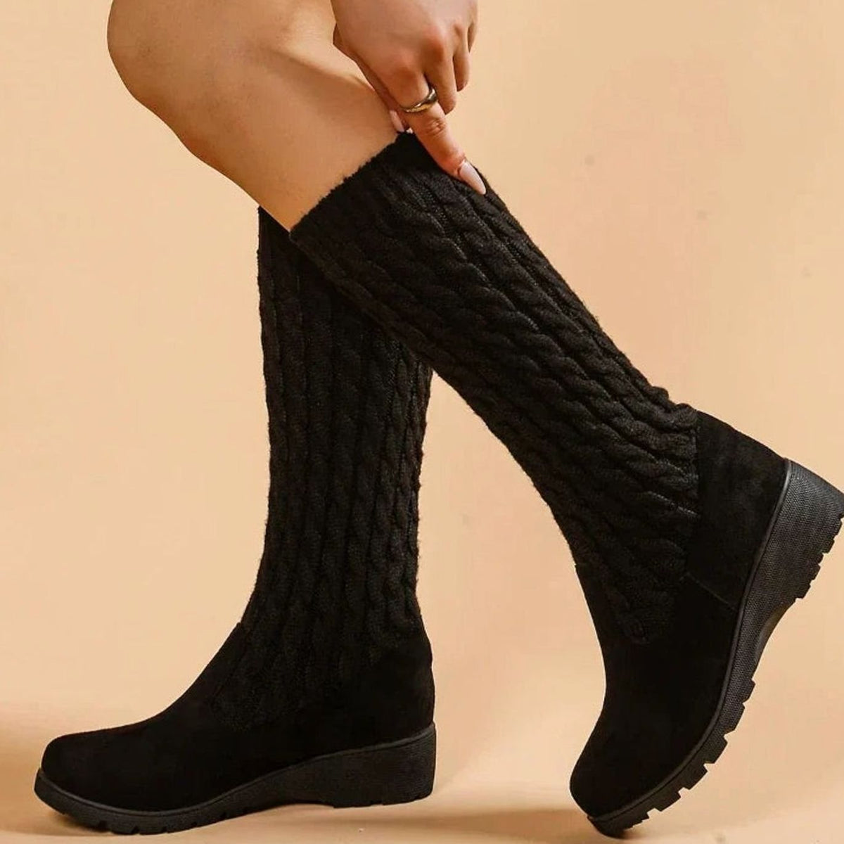 Cable knit knee-high boots in black for women