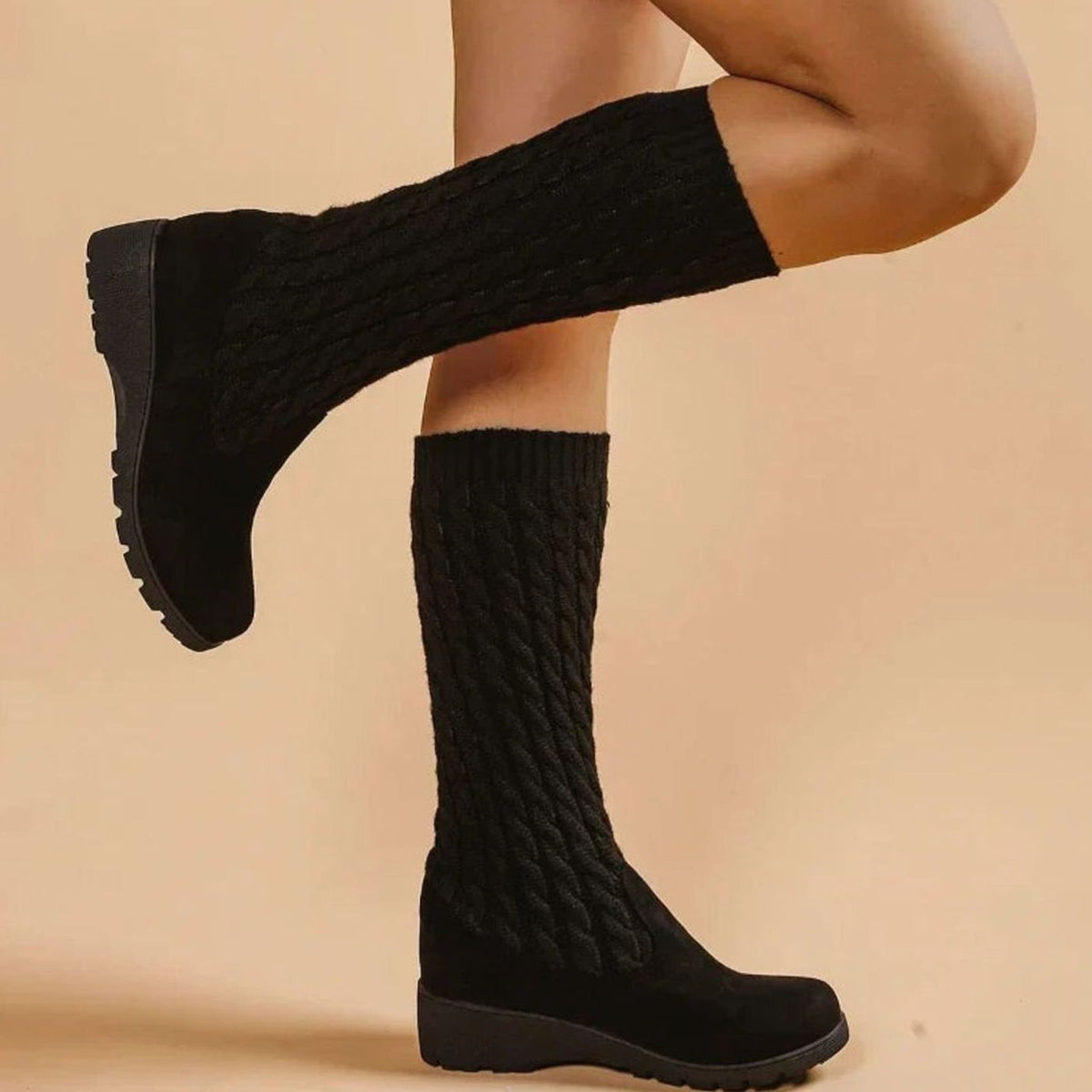 Cable knit knee-high boots in black for women