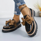 Big bow patent-look platform loafers for women