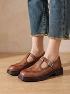 Wingtip buckle T-strap flats for women