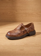 Wingtip buckle T-strap flats for women